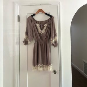 Beautiful Bebe sundress. Feels like silk cut out on arms. Flowey when you walk